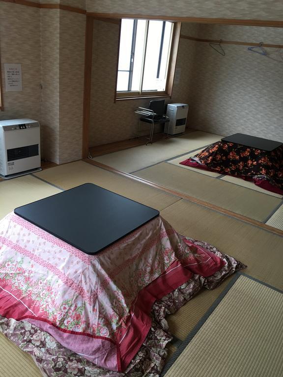 Onsen Minshuku Yutakaya Hotel Юзава Екстериор снимка